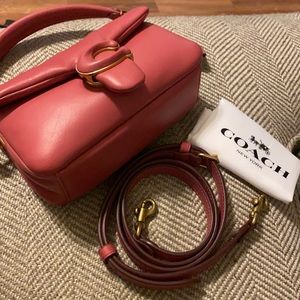 Coach pillow tabby 18 in color rouge